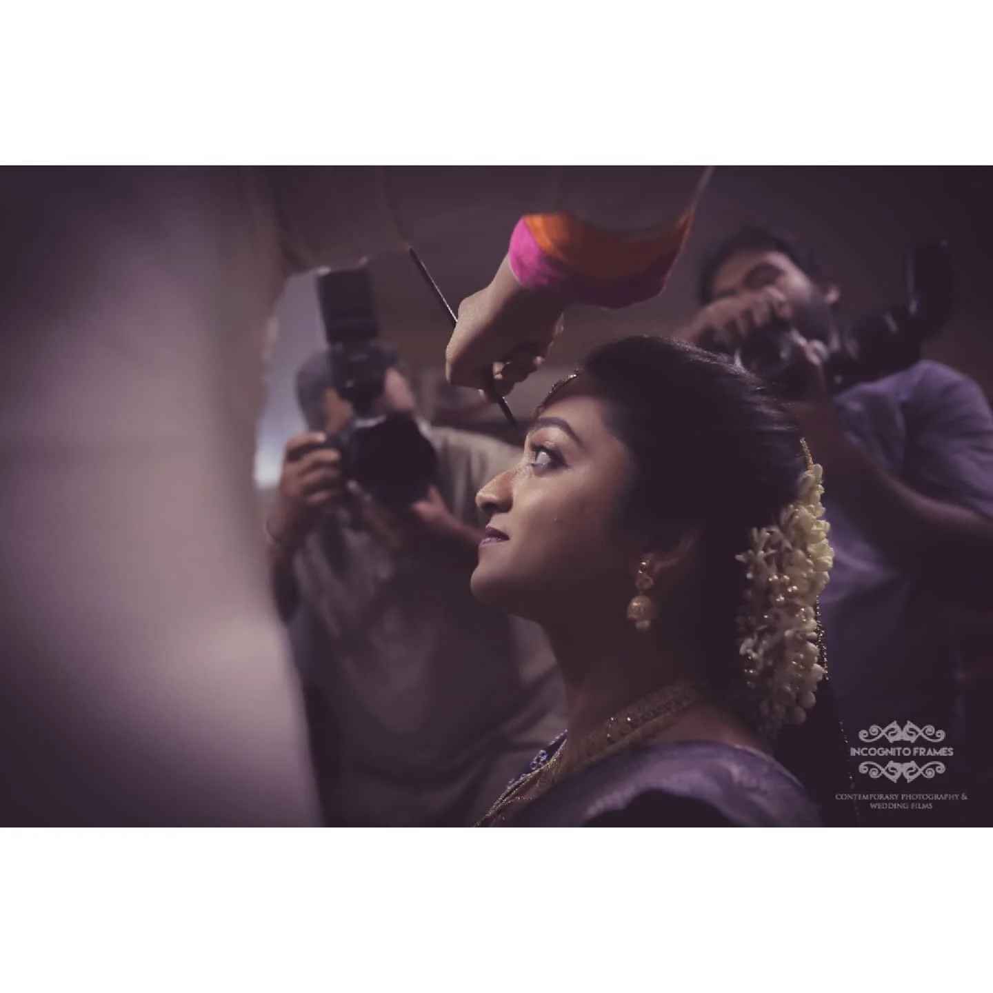When you can be calm, composed and smiling admist all the chaos caused by your gang of friends who are getting ready along with you, a group of #photographers from the bride and groom's surrounding you for a nice click and the last minute touch up by