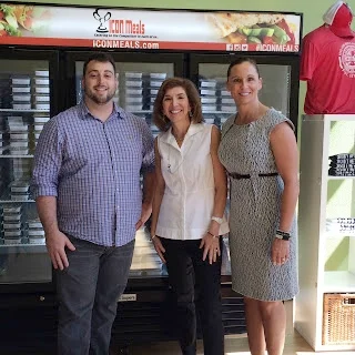 Posing with Patricia and Matt in front of the ICON Meals storefront where you can see all the delicious refrigerated meals behind us!