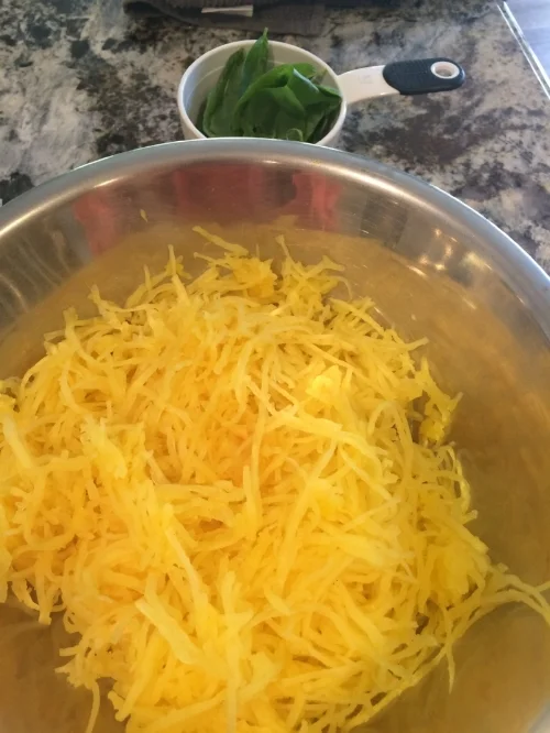 Poke holes in squash with a fork, put whole squash in microwave and cook about 10 minutes. Then cool, cut and remove the seeds and make strands with your fork!
