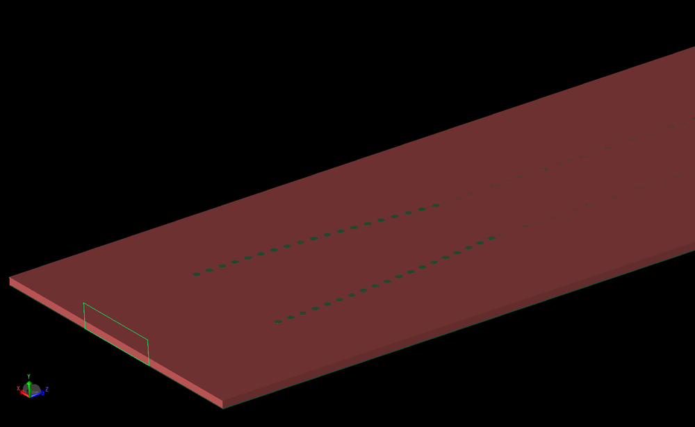 Figure 4: With the top microstrip layer removed, the substrate and some of the vias are visible in the antenna structure.