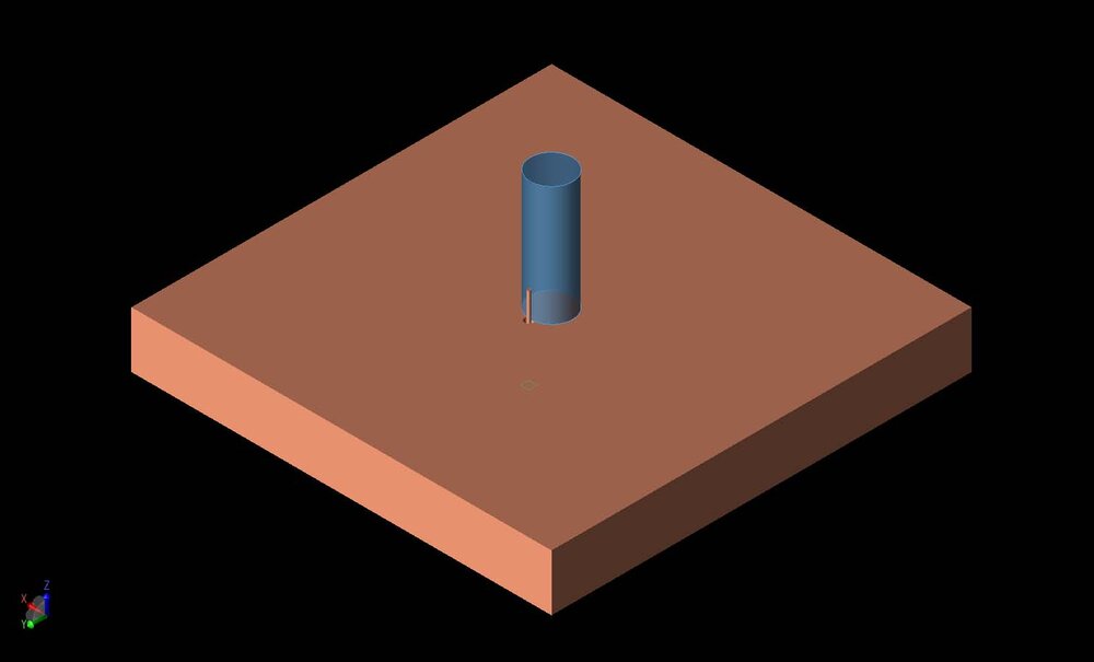 Figure 1: A three-dimensional CAD representation of the geometry is shown with a conducting ground plane under a cylindrical dielectric resonator with permittivity of 7. The resonator is excited by a coaxial probe on one side of the cylinder.