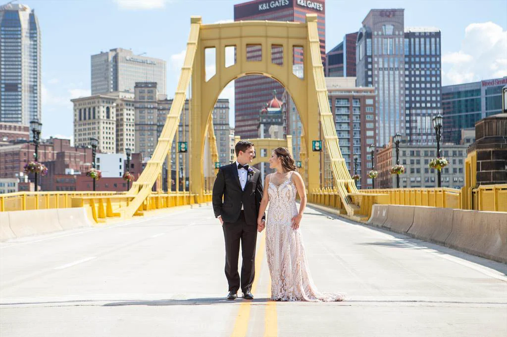 Wedding photo of Jesse Trowbridge (MBA 2014) and JoAnn Trowbridge (MBA 2015) on the Andy Warhol Bridge in Pittsburgh, Pennsylvania.