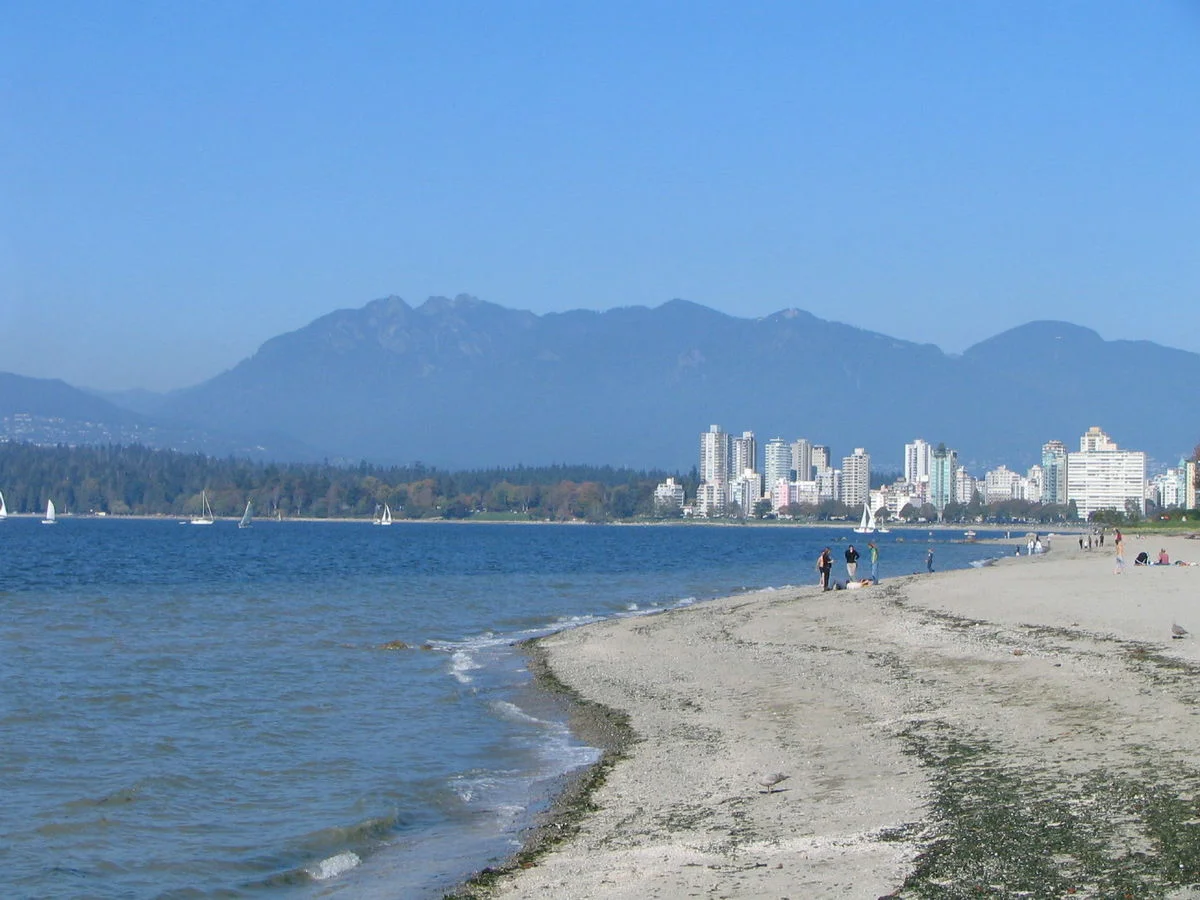 Kitsilano_Beach_with_the_West_End,_Stanley_Park_and_the_North_Shore_Mountains_in_the_distance.jpg