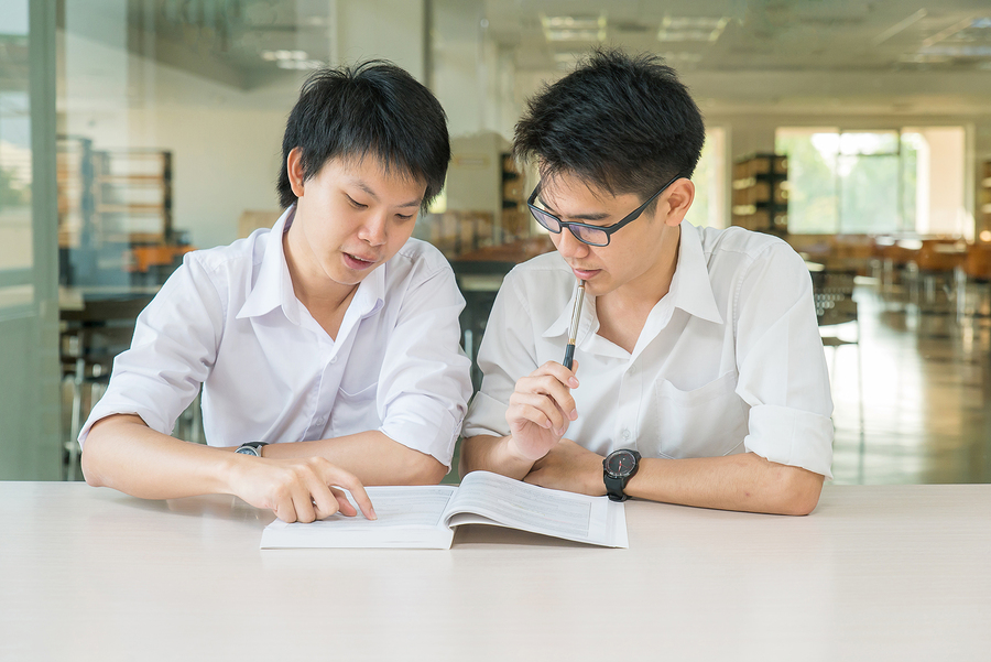 bigstock-Two-Asian-Students-Studying-To-83657135.jpg