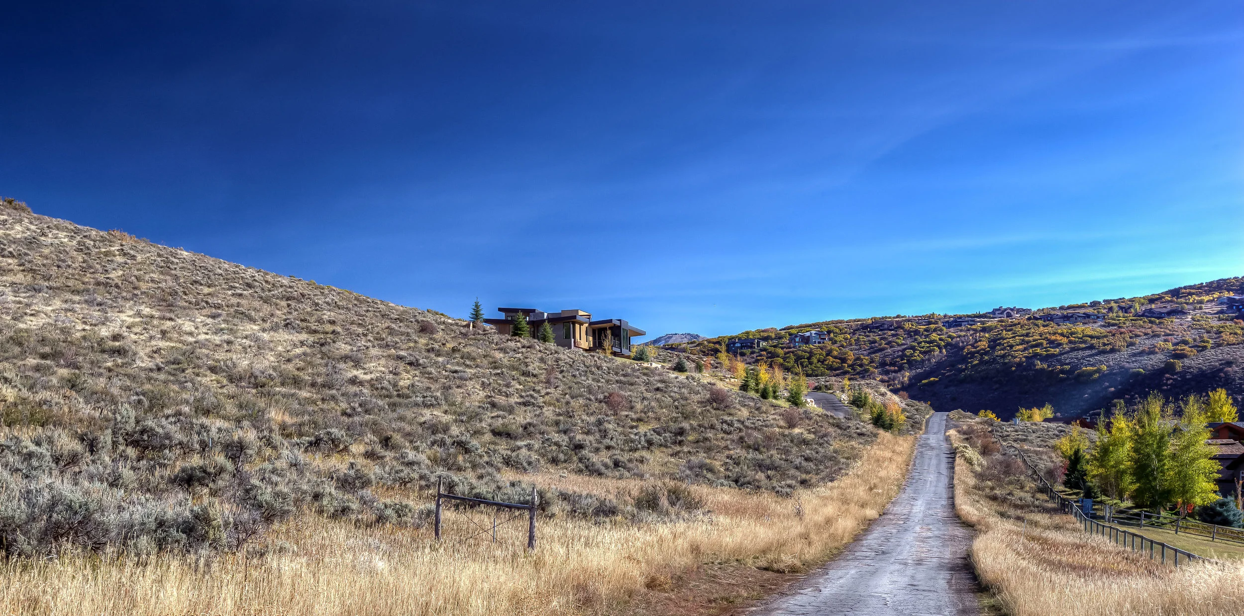Corey Residence 3713-01_E0E7819_Ext Day N Side site .jpg