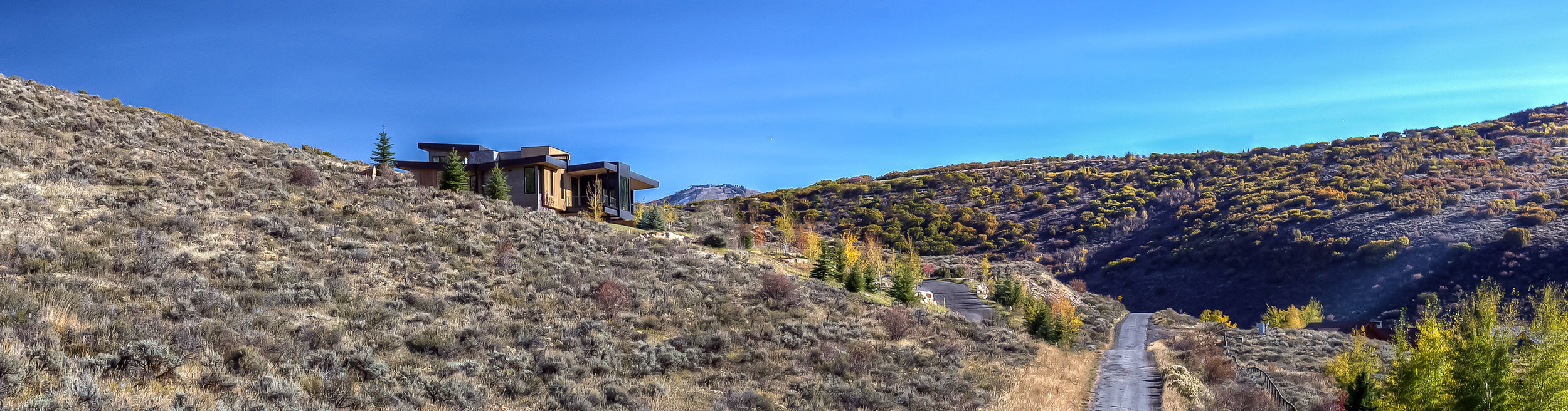 Corey Residence 3713-01a_E0E7819a_Ext Day N Side site .jpg