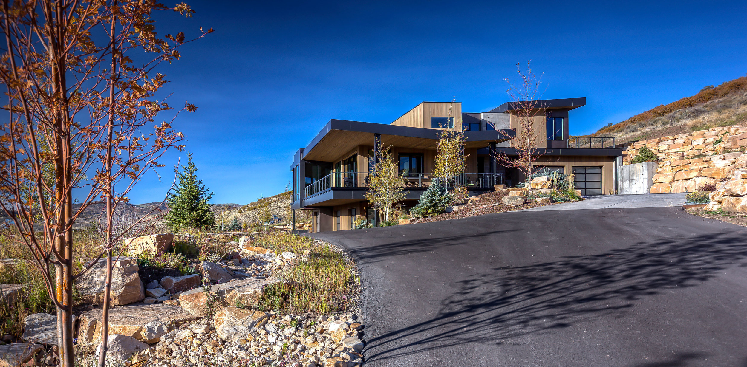 Corey Residence 3713-02_E0E7831_Ext Day South Side from Driveway.jpg