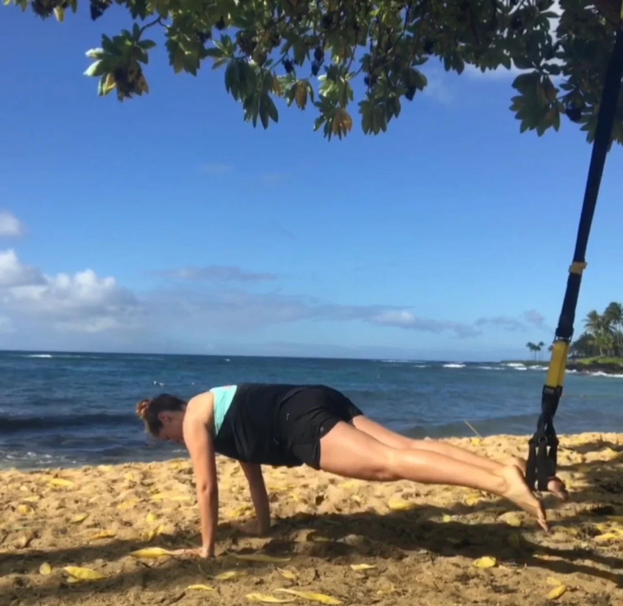 28 weeks - using TRX bands on the sand to challenge my stability even more!