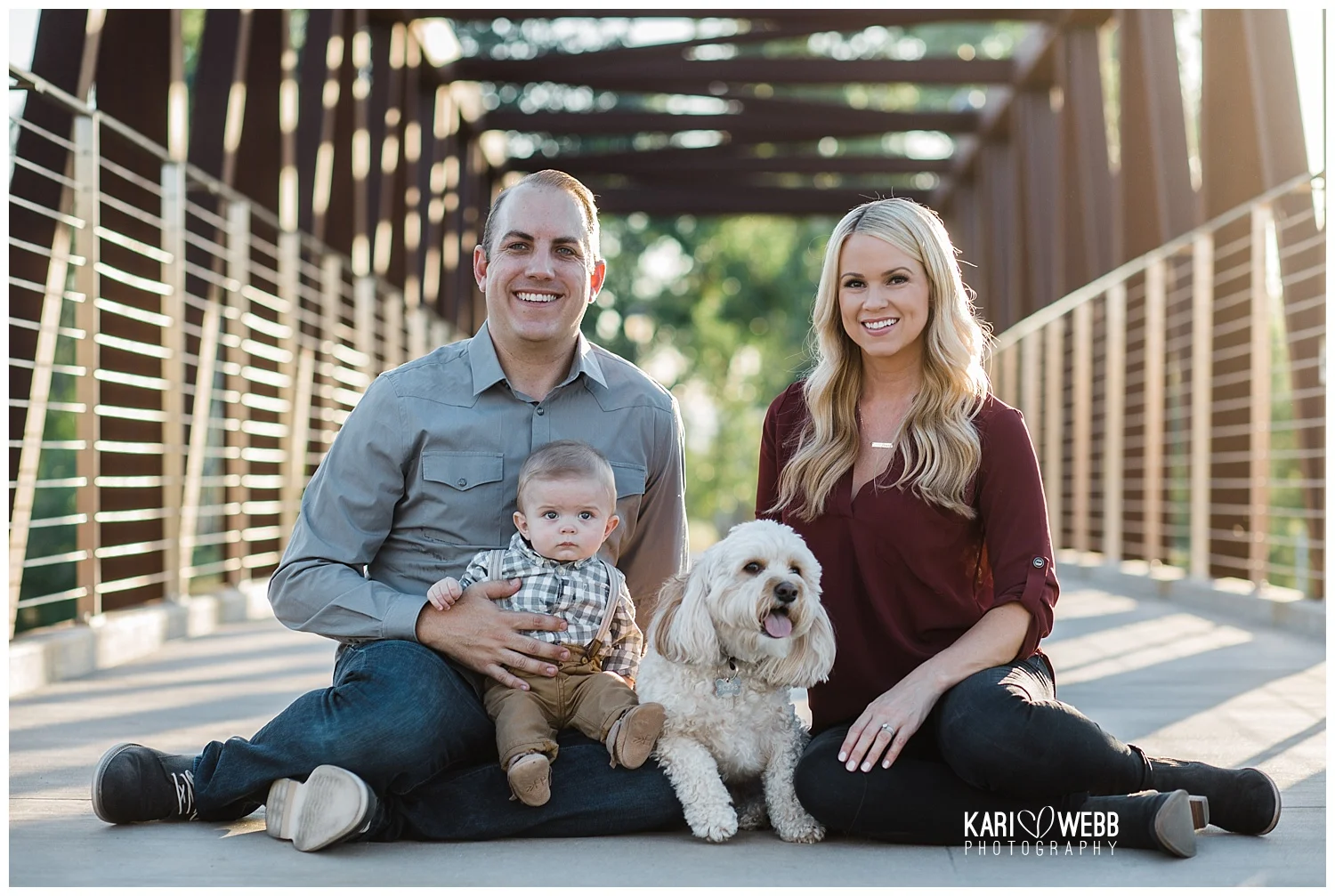 Kari Webb Photography_Irvine Family Photographer_ Family of three sitting on bridge.jpg