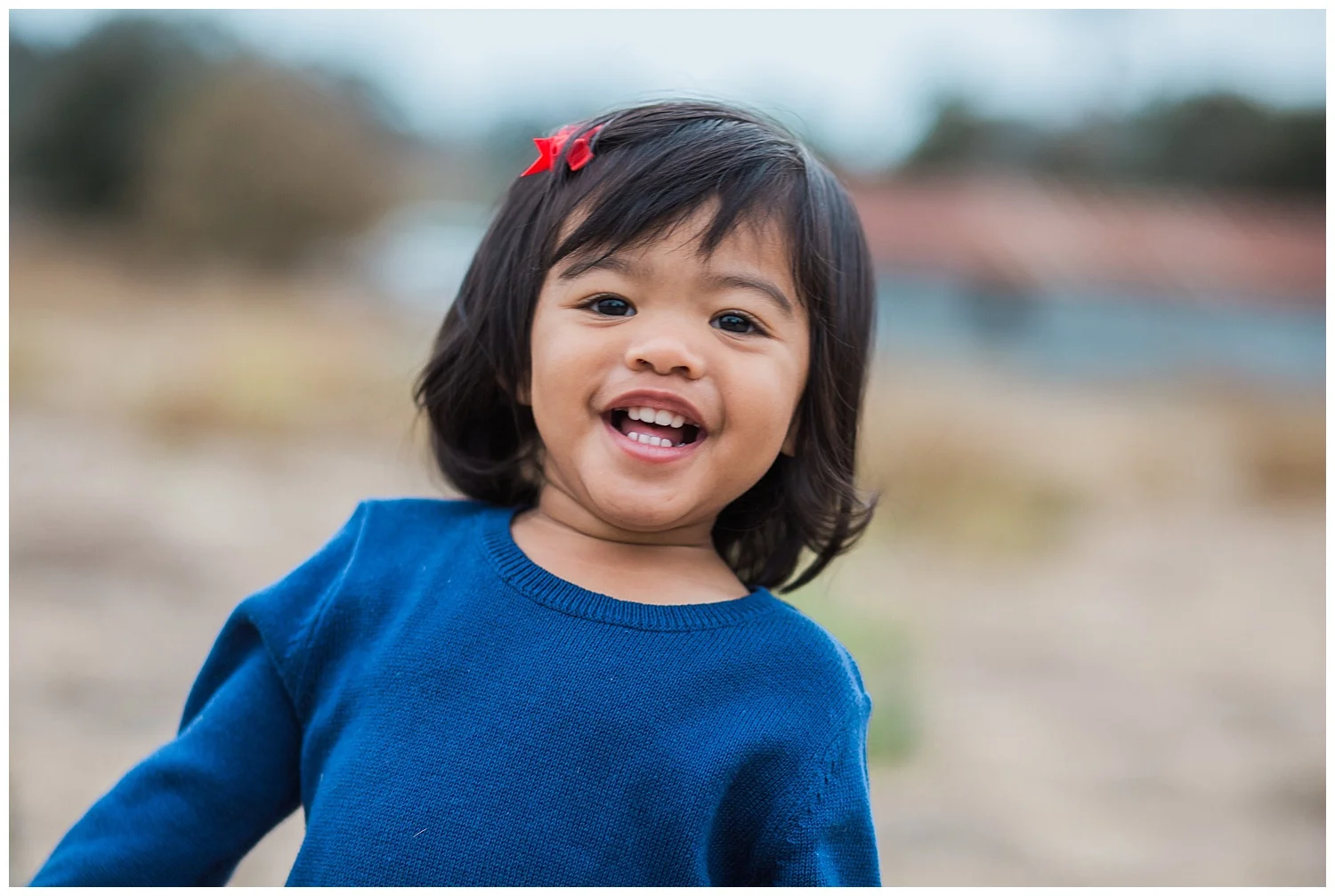 Kari Webb Photography San Juan Capistrano little girl with big smile.jpg