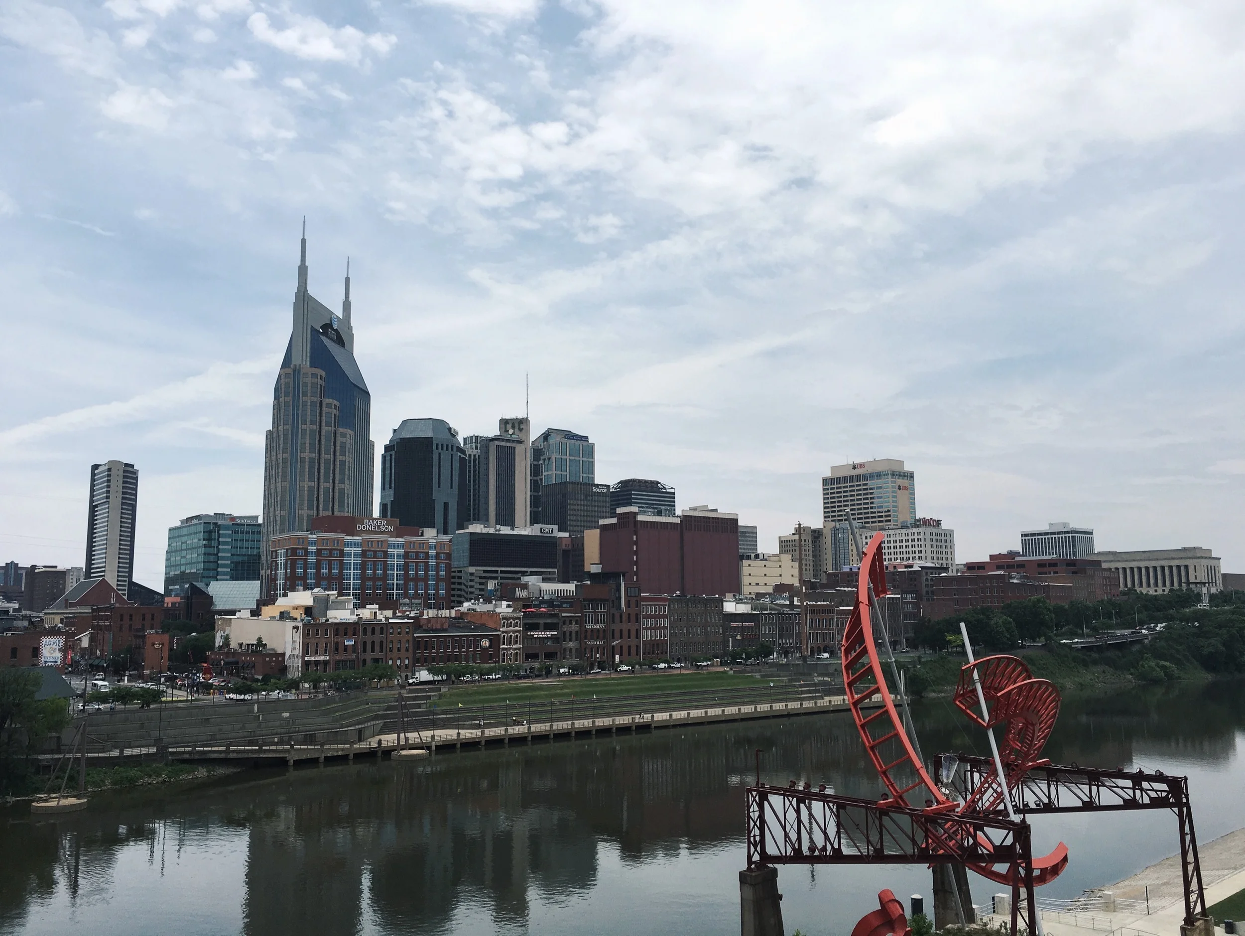 Downtown Nashville, as seen from the John Seigenthaler pedestrian bridge crossing the Cumberland River.