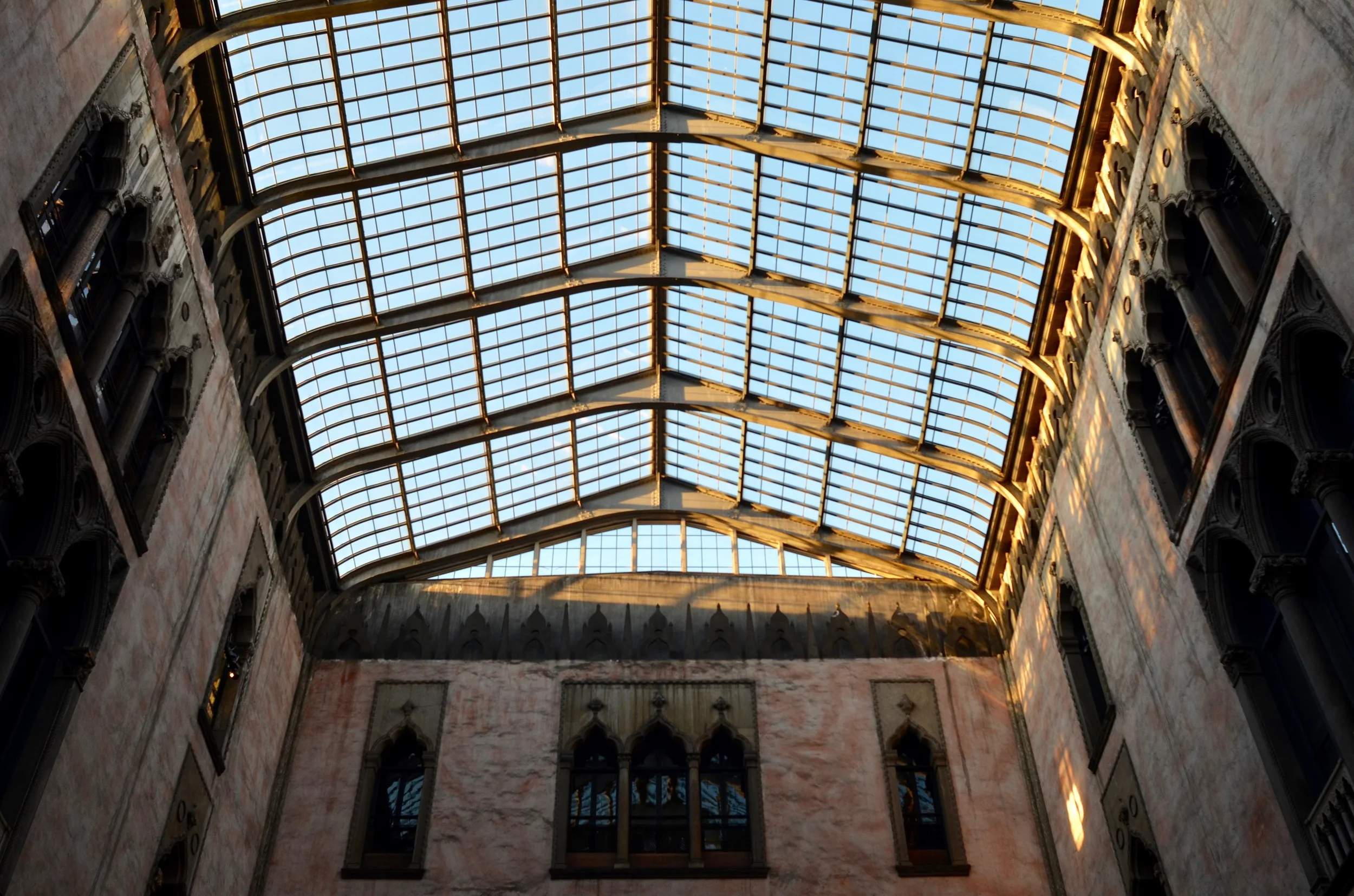 Looking up: the glass ceiling that protects the courtyard from the elements.