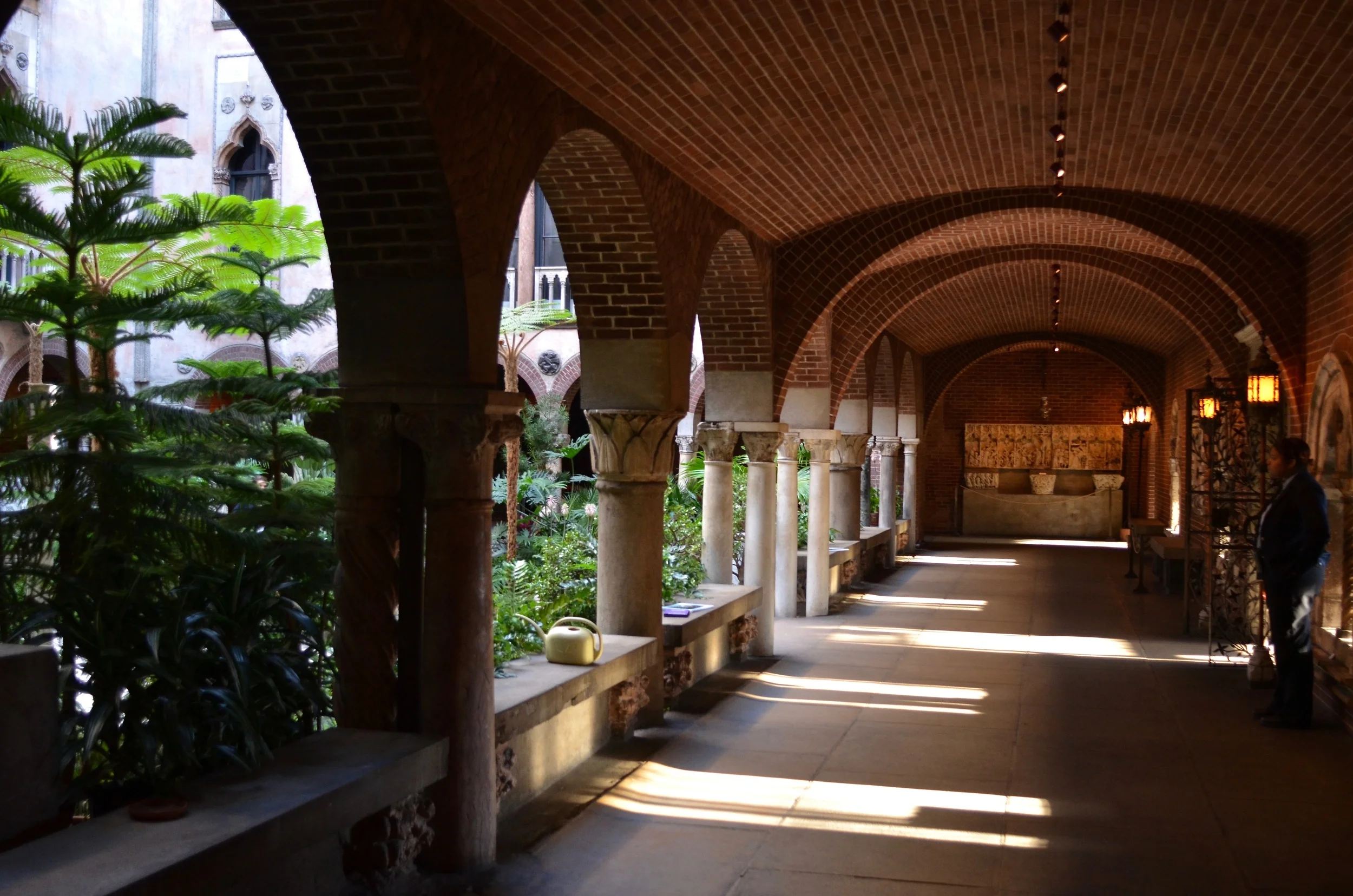 Carrasquillo tells me this is one of her favourite parts of the museum: the contrast between the dark, cool brick hall that rings the main garden, and the vivid, airy, warm garden.