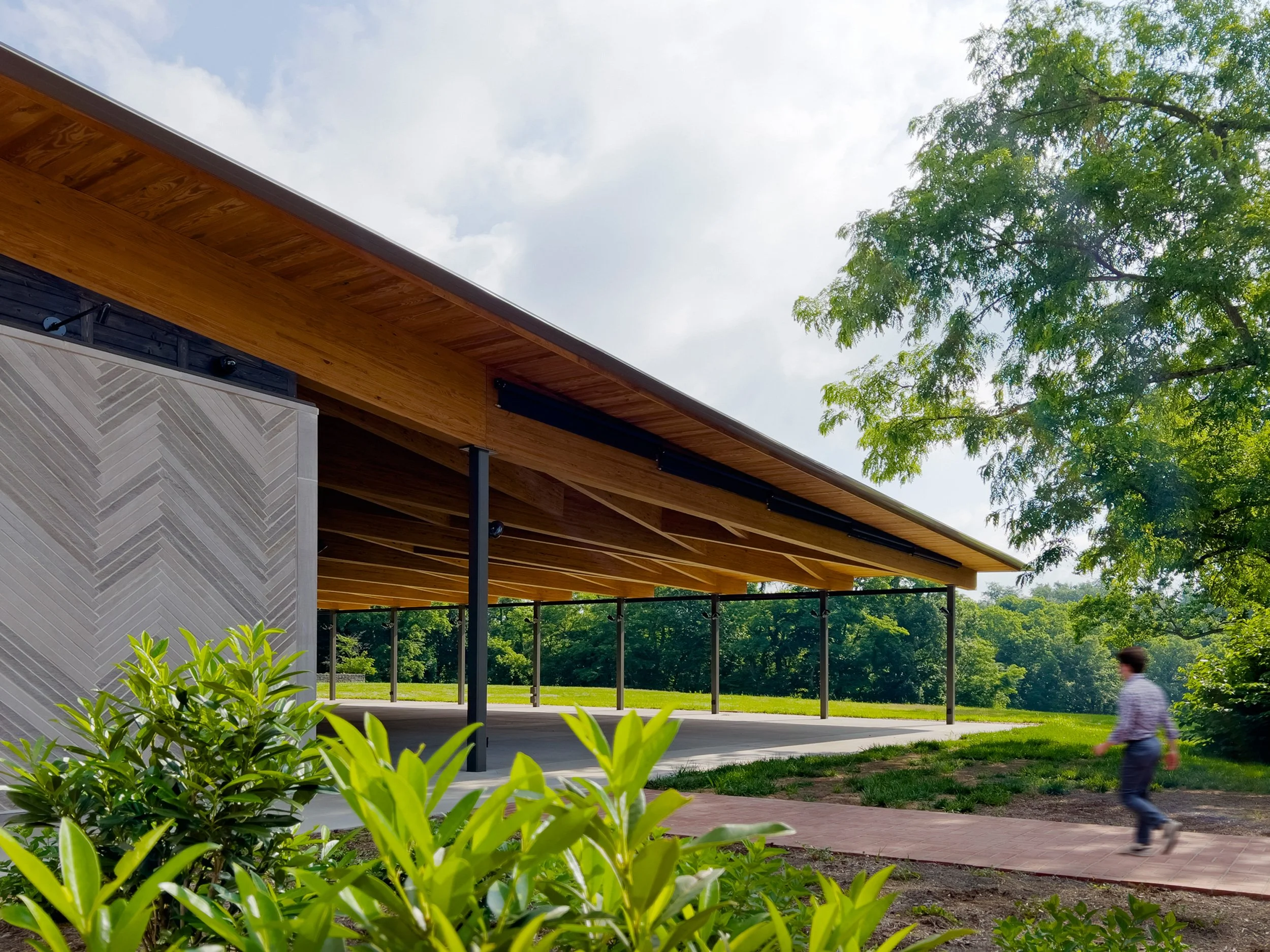locust-grove-pavilion-exterior-porch-canopy-approach-limestone-facade-herringbone-glulam-wood-structure-louisville-dpaw.jpg