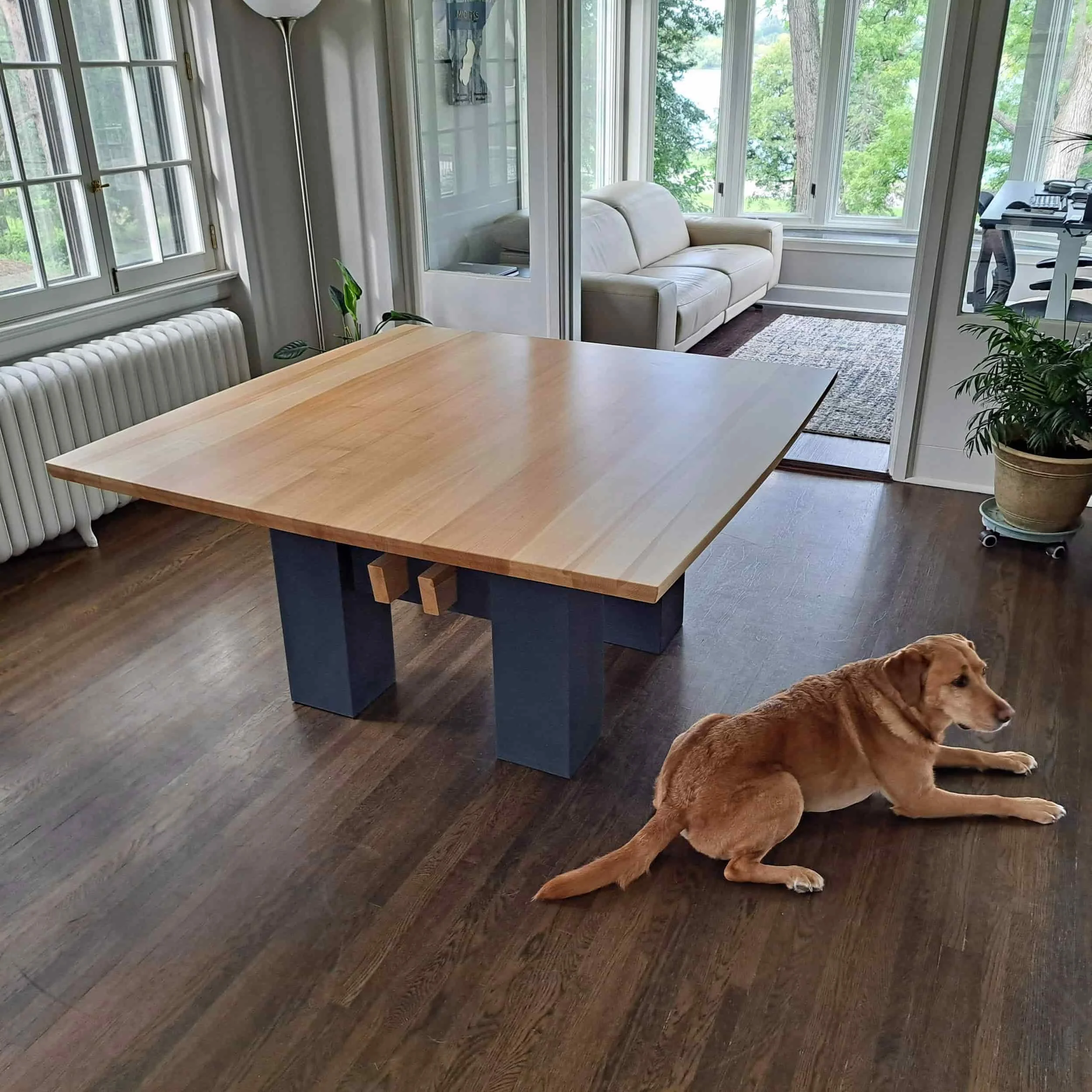 Square maple trestle dining table