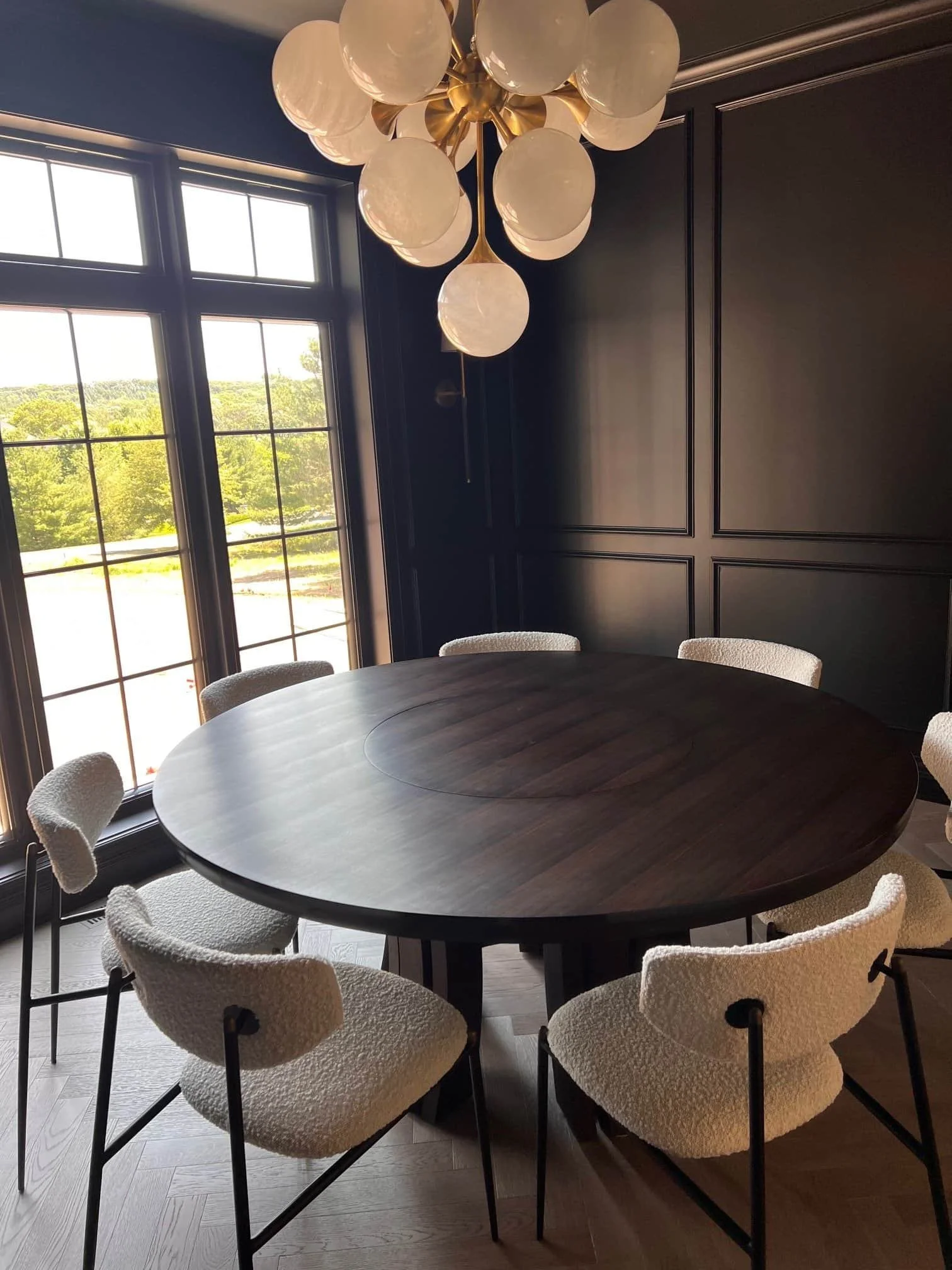 Round ebony dining table