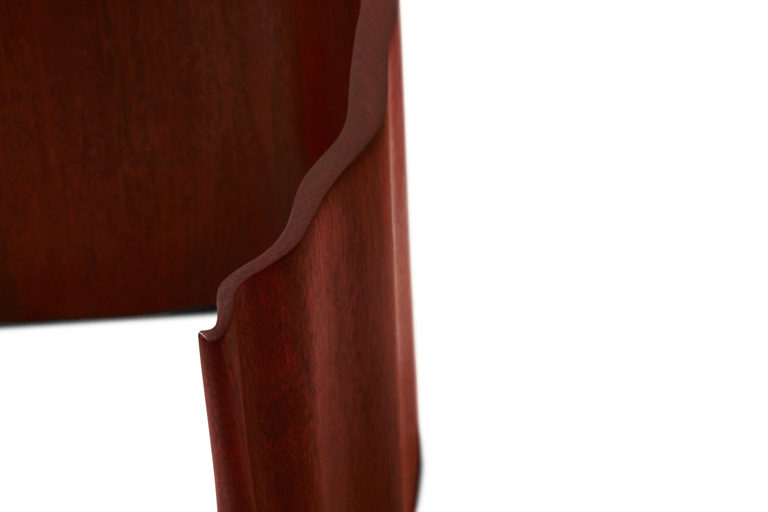 Mahogany ribbon table end detail