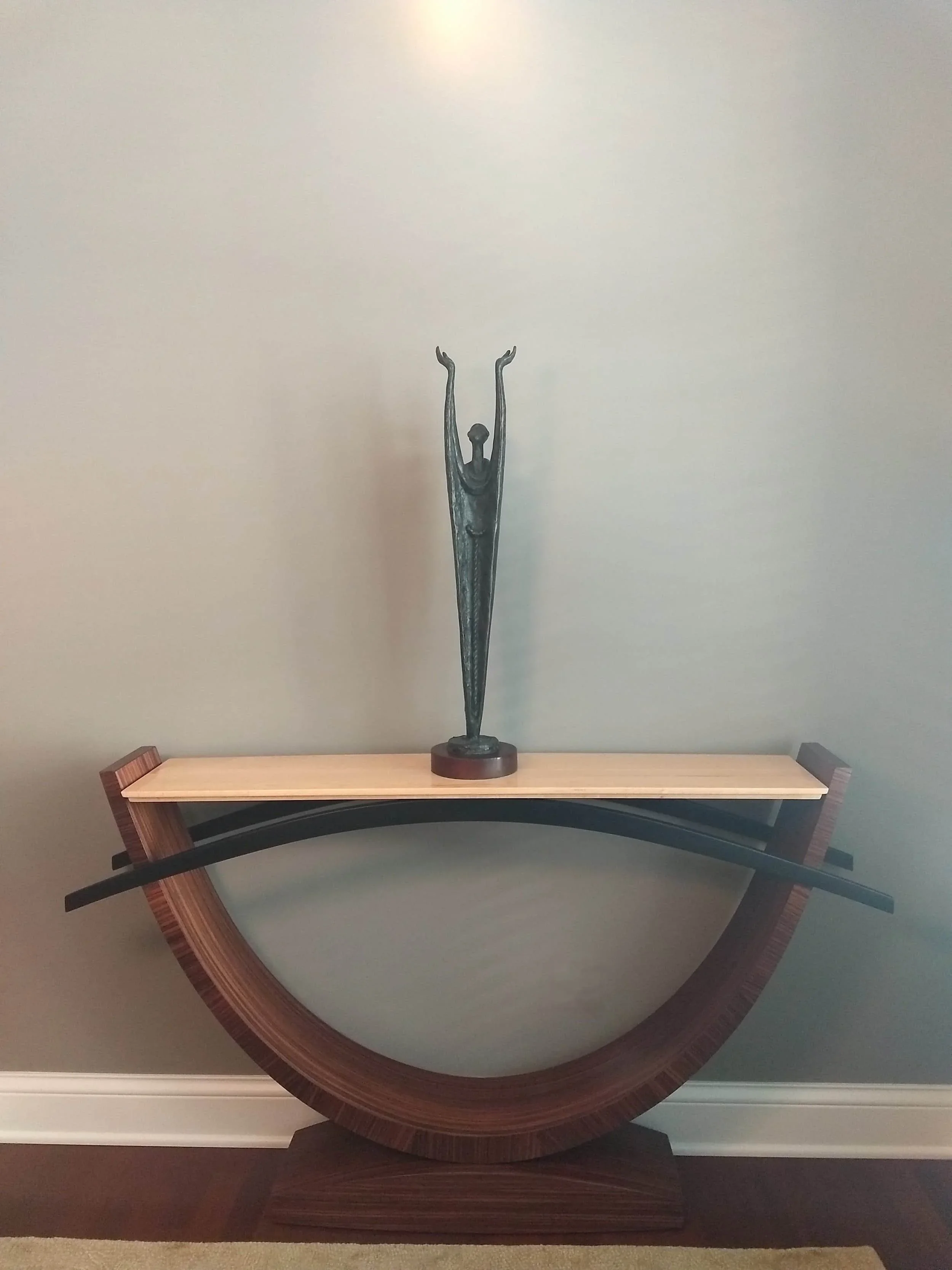 Opposing Arches table for Francisco Brazos al Cielo