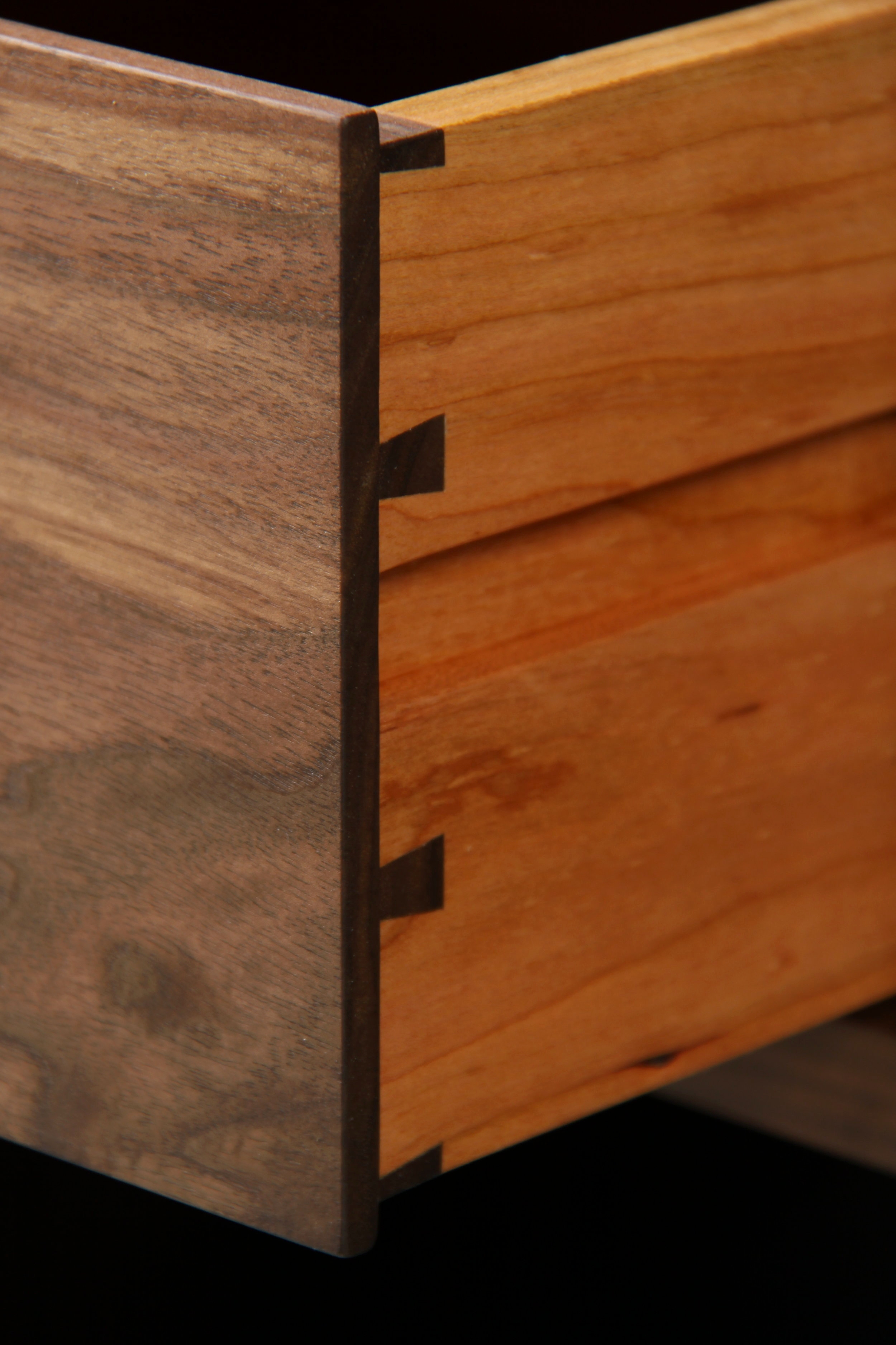 Dovetailed drawers on bedside tables