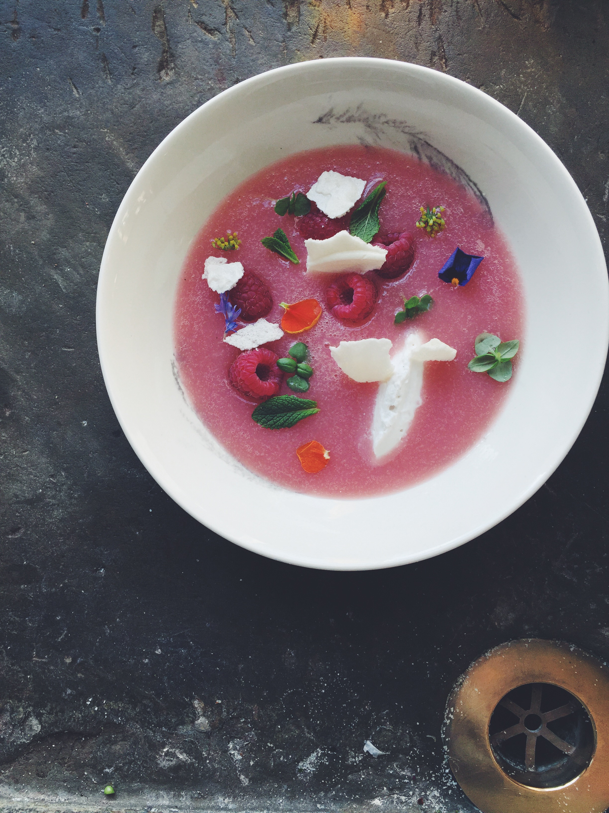 HillFoodCo_Peach and apricot liquor soup, vanilla coconut cream, Meringue, basil, raspberries and herbs.jpg