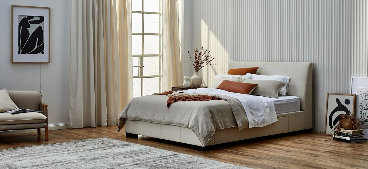 SNZ-45787_Memphis-Tapered-Headboard-4-Drawer-Base_QS_Bedframe_Ivory_Lifestyle_Angle.jpg
