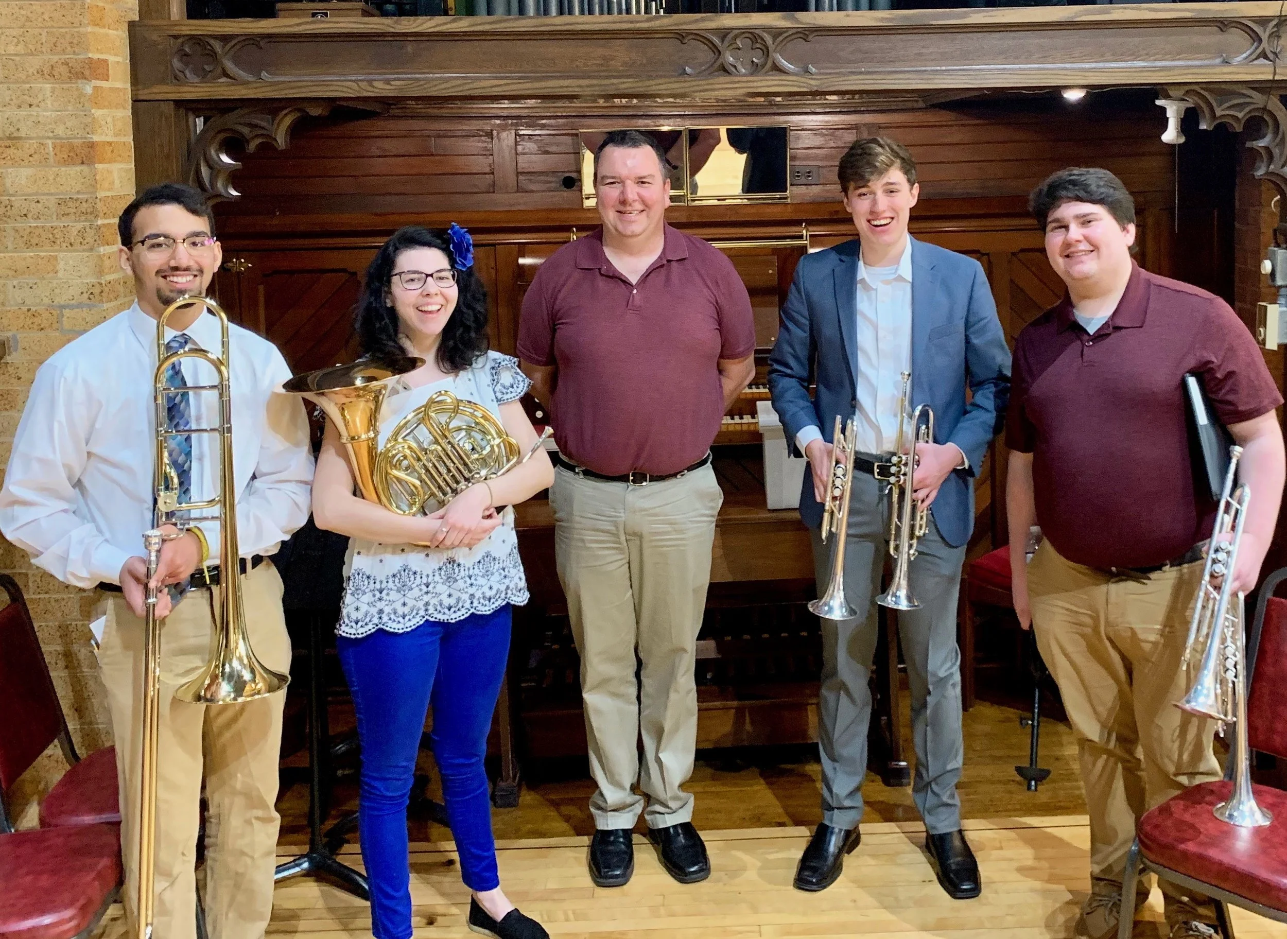 Organist & Minister of Music, W. Stephen Rose (center), with the Easter brass quartet, led by Hali Shepard (center-left).