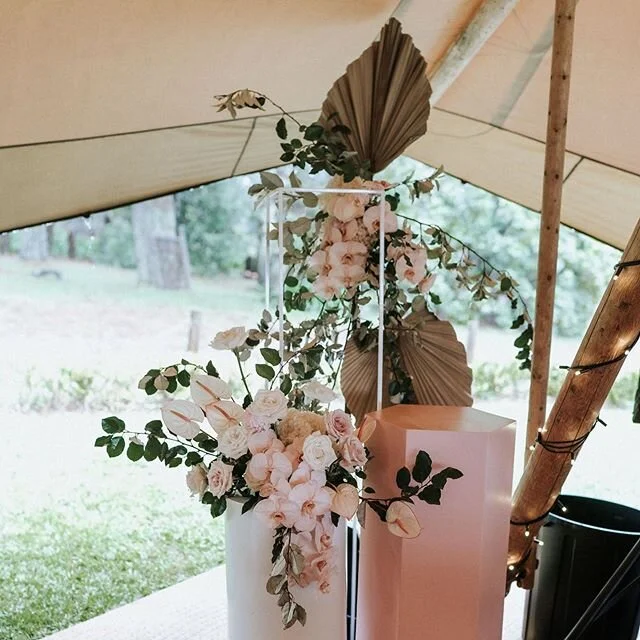 One half of Hayley &amp; Michael&rsquo;s ceremony spot. The skye opened up and poured rain all day long but these lovers took advantage of their gorgeous reception tent and celebrated it up anyway! 💕 Image by @theevokecompany Styling by @eventsbygrey Tent by @matakatatipis