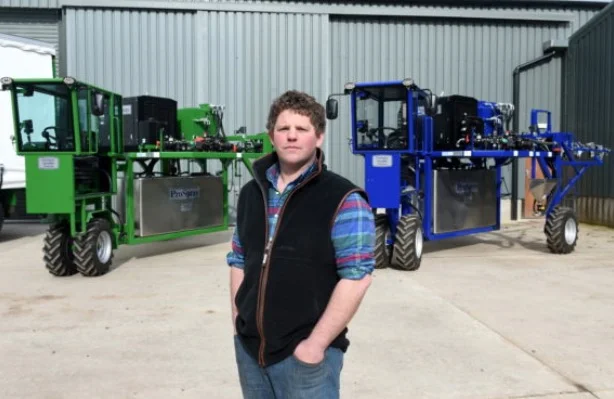 Gillan McDonald with two of the sprayers (source: www.pressandjournal.co.uk )