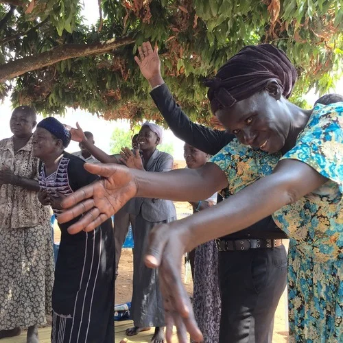 Women of Gwoke in Patongo, Uganda welcoming a new rootIO station.