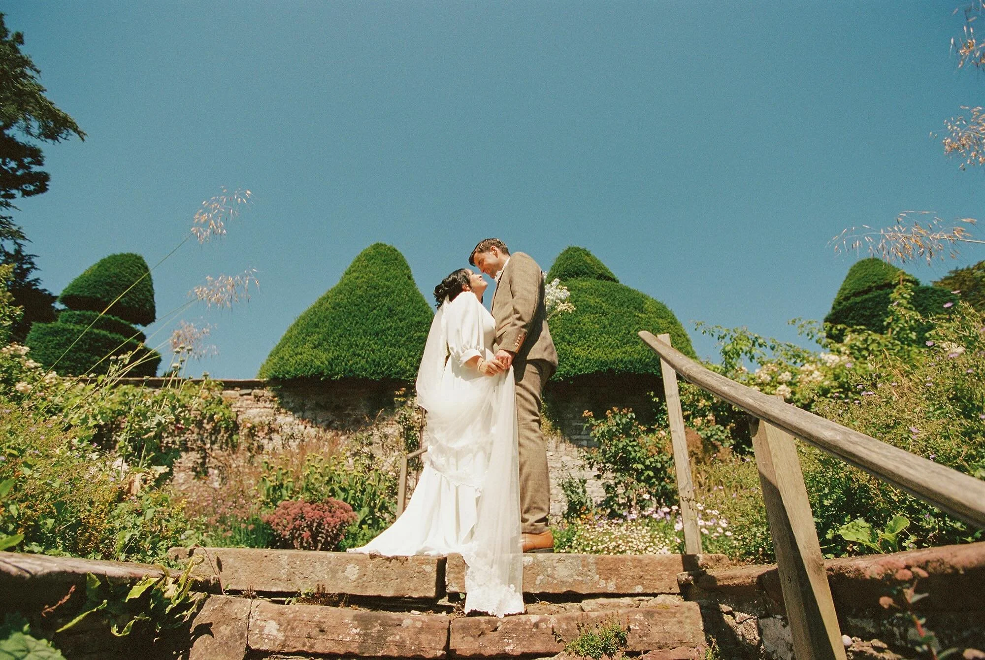 A little bit of time after the ceremony for some couples portraits is always special. A small moment for the couple to catch their breath together before the celebrations get underway for the rest of the day and into the evening 💛 #film