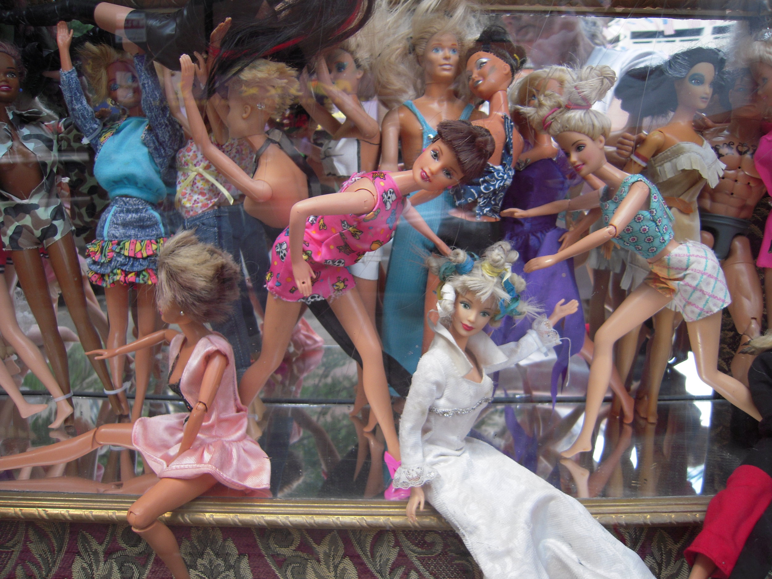 Barbies in the Window