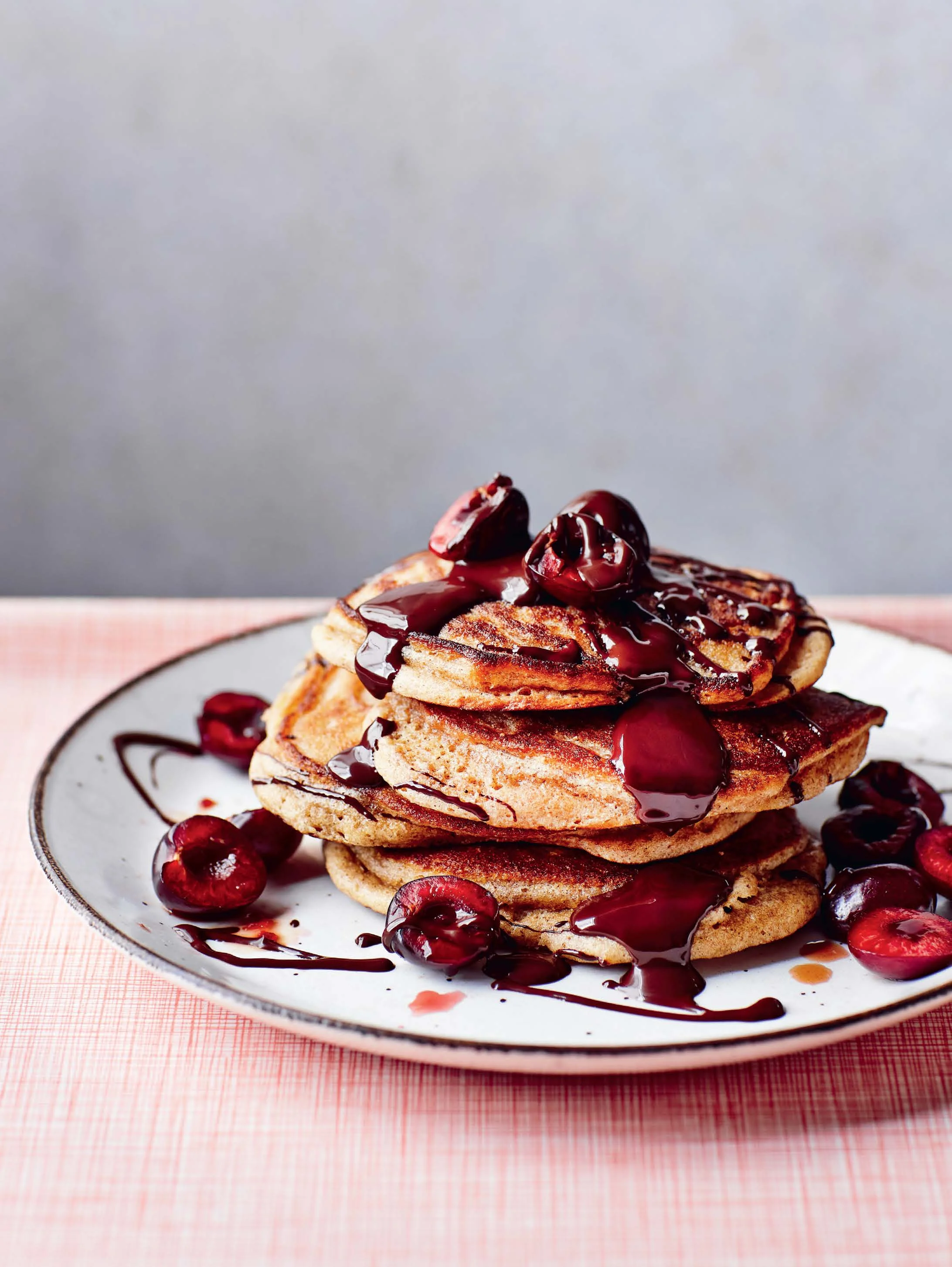 Buttermilk Pancake Stack with Cherries and Chocolate Drizzle