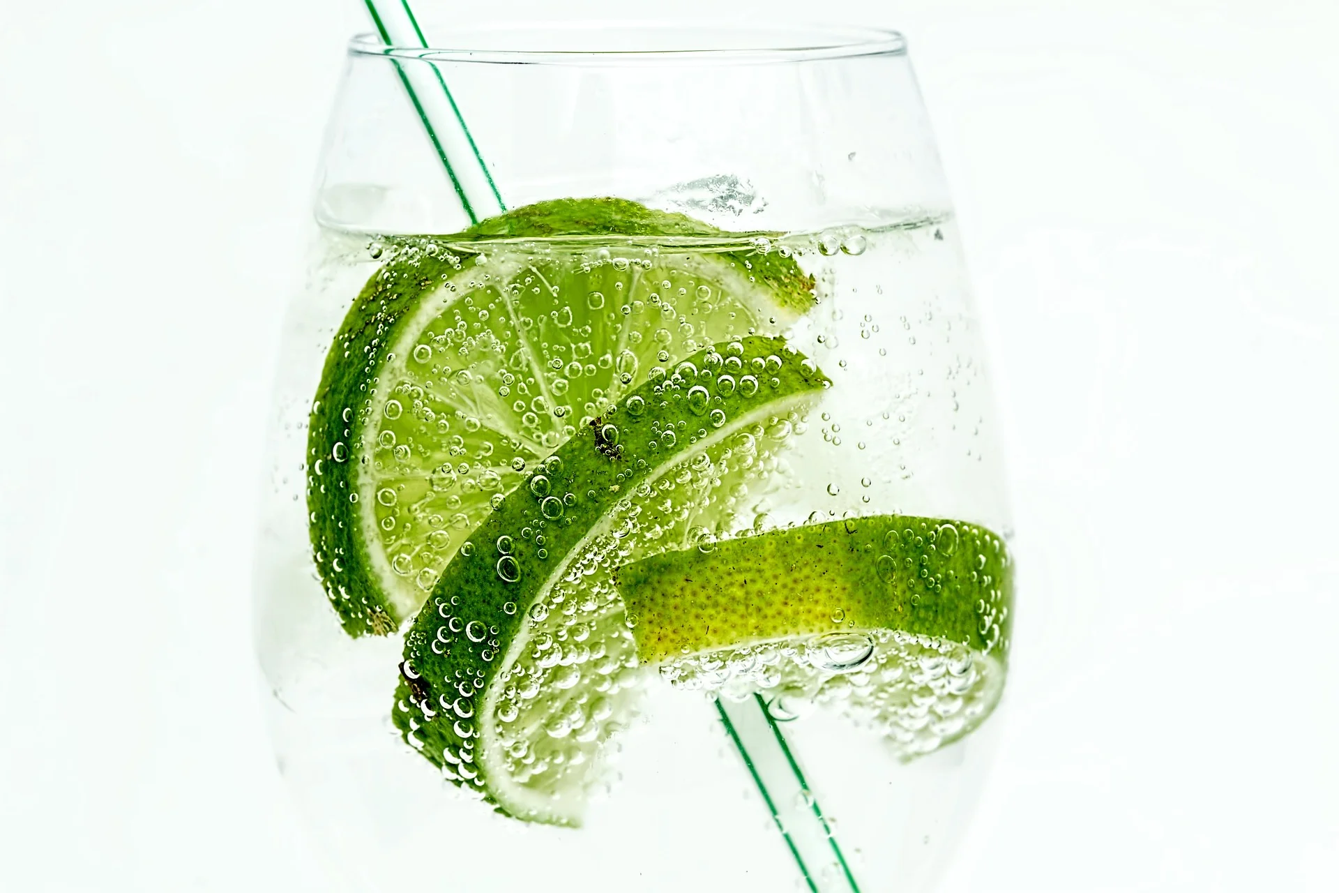 Switch to a soda & fresh lime - refreshing and looks like a G&T ;)