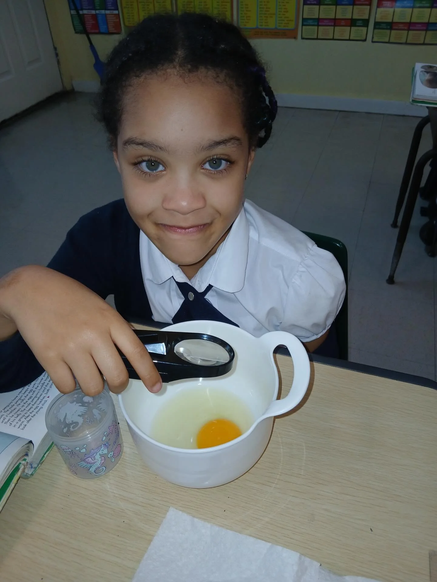 Third grade students enjoyed a hands-on science lesson exploring the parts of an egg. Through investigation, they identified the yolk and membrane and learned where a chick develops.