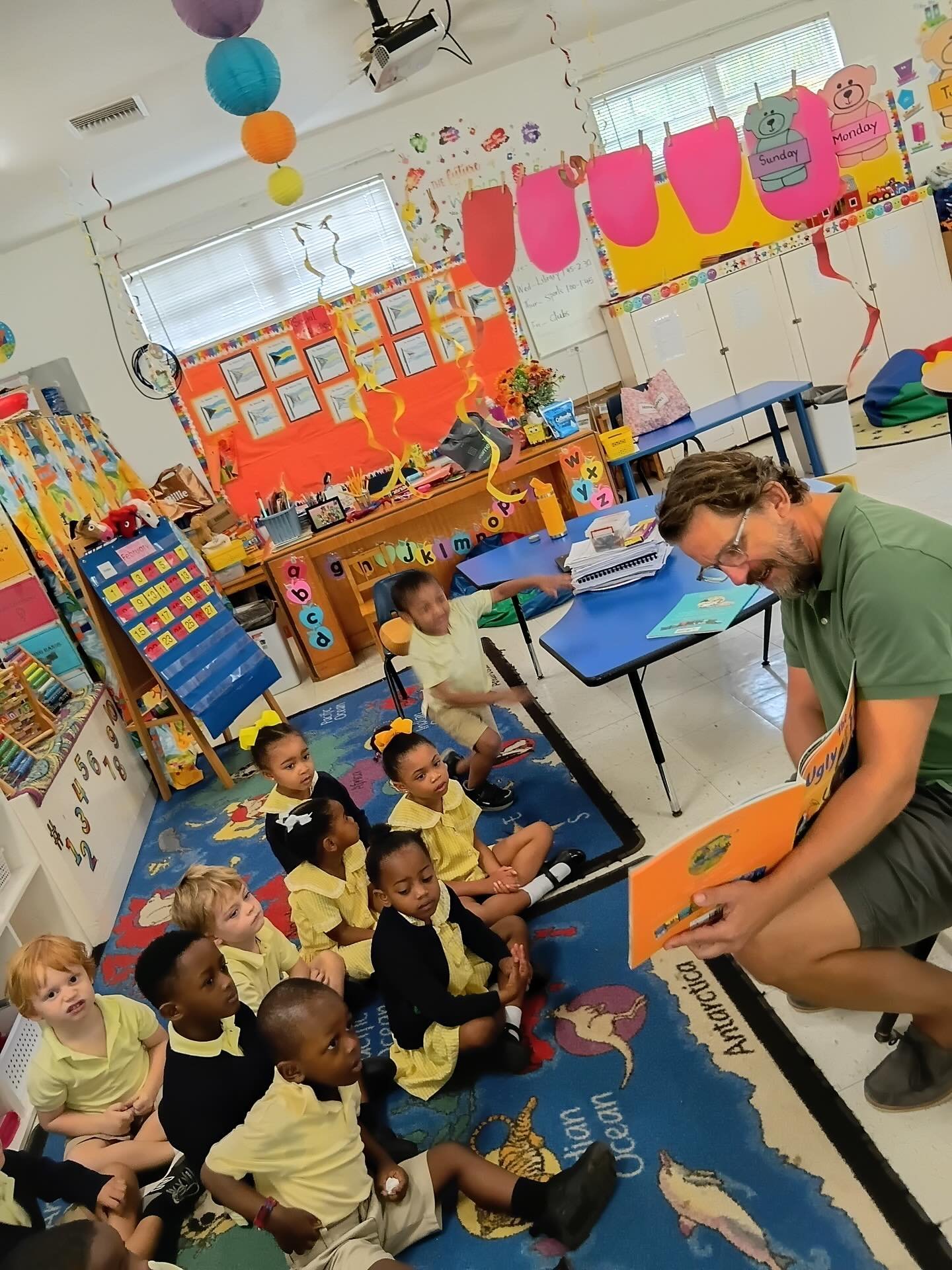 Parents enjoy interacting with Pre-K students, frequently visiting the  classroom in the mornings to read stories. We are more than a school: we are a strong, supportive community.