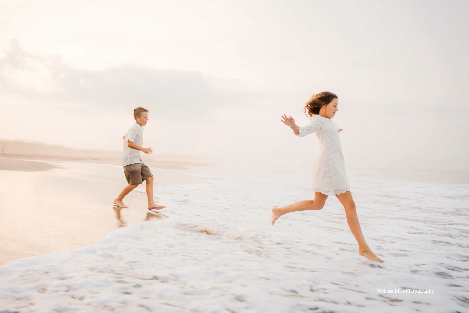 kids-running-into-waves-virginia-beach-family-photographer-melissa-bliss-photography-sunset-beach-sessions-hampton-roads.jpg