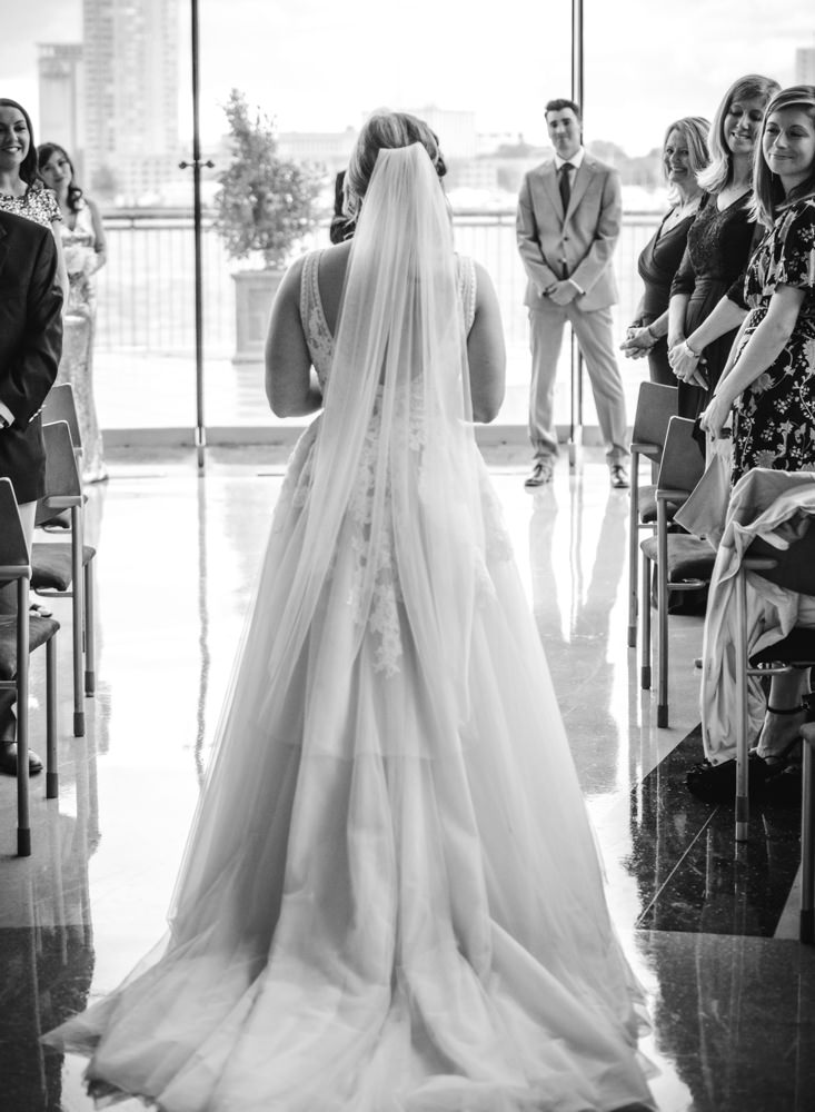 bride-walks-down-the-aisle-half-moone-cruise-center-wedding-norfolk-VA.jpg