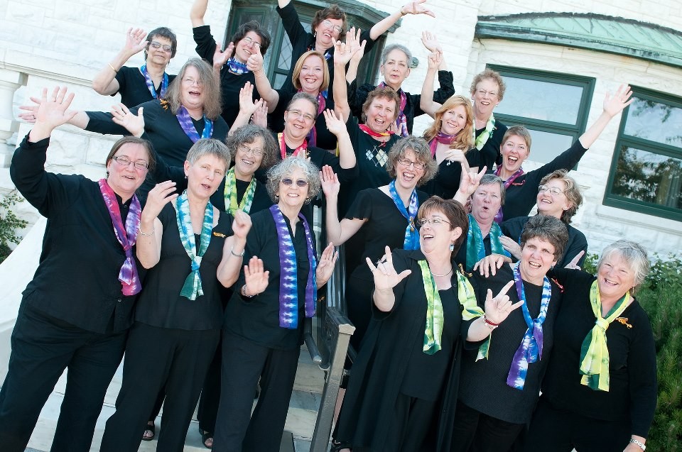 Windsong members prepare for a performance
