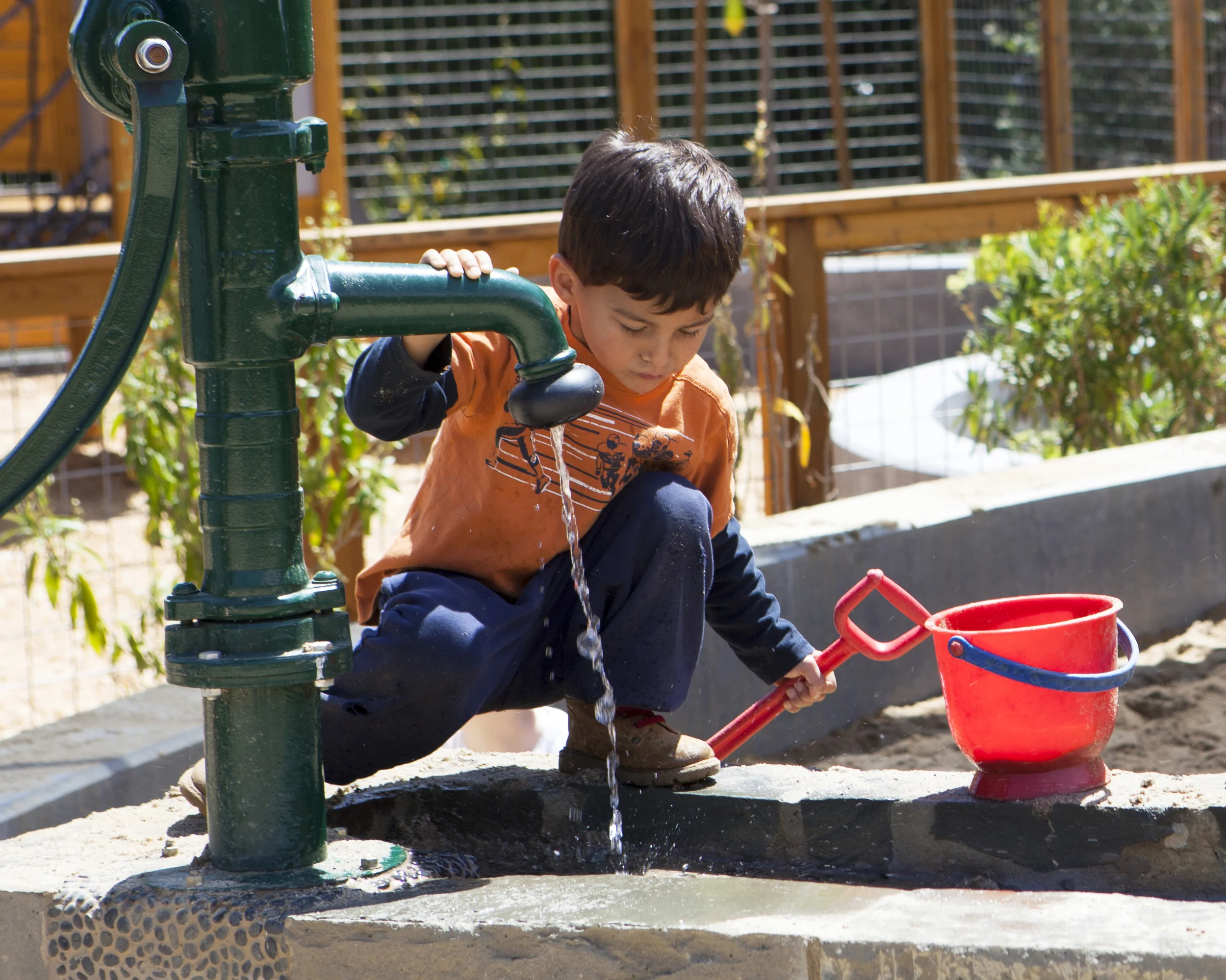 boy with water pump_horiz.jpg
