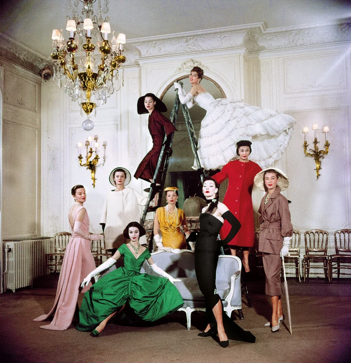 Models pose in the new Christian Dior collection at House of Dior’s headquarters, Paris in 1957. Photograph: Loomis Dean/Time Life Pictures