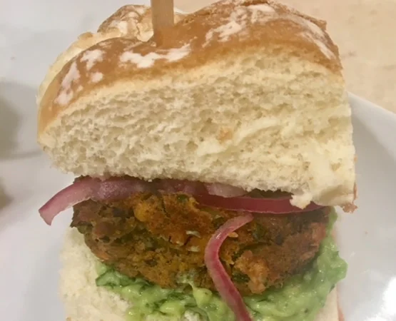 Black Bean & Yam Slider topped with Avocado Mousse & Pickled Red Onions