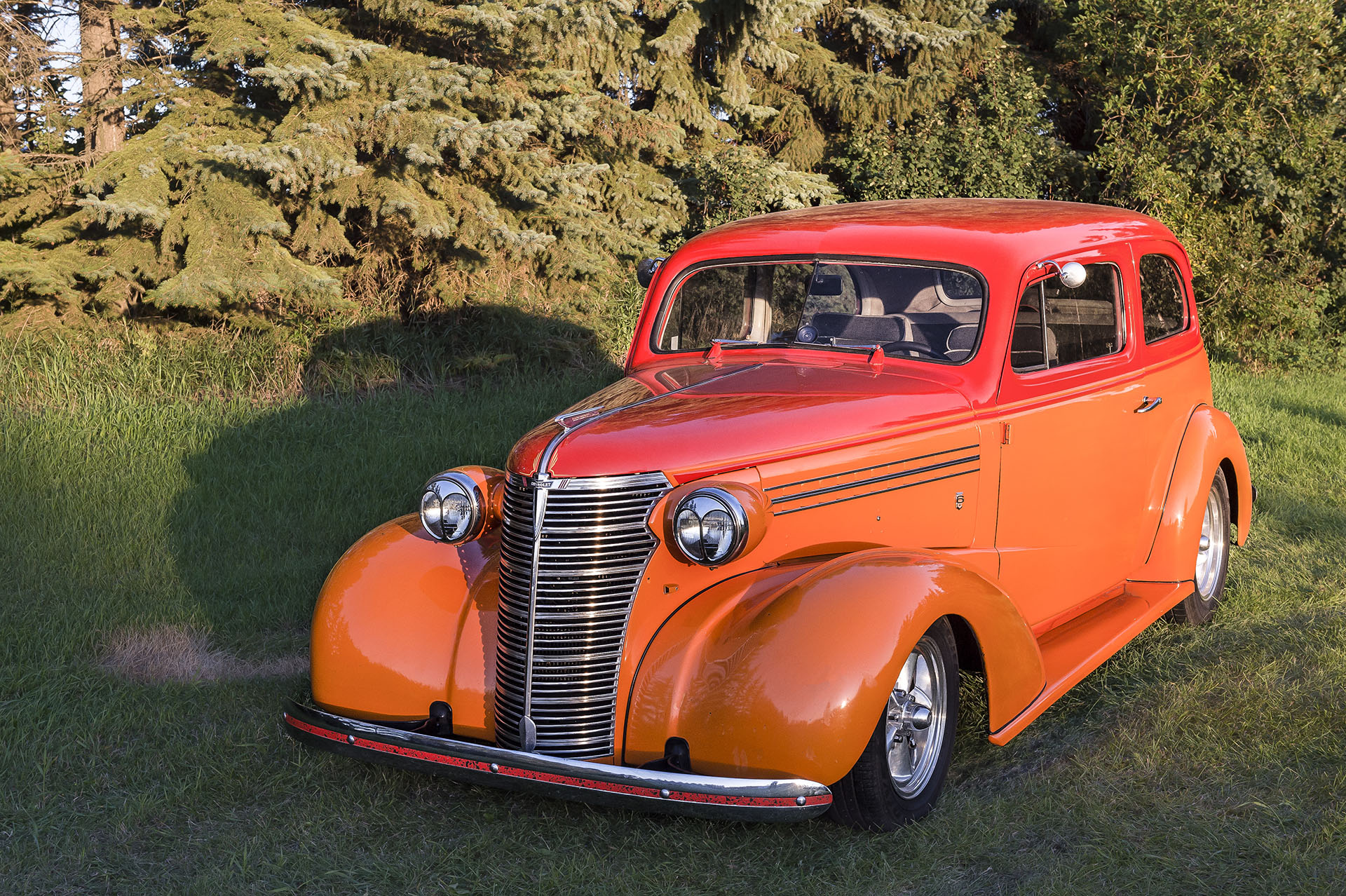   1938 – Chevy Master Sedan&nbsp; - “ C Plus”&nbsp; -    Powered by a 350/290 hp GM performance Crate Engine.&nbsp; Originally built in Regina at the GM Assembly Plant purchased in Regina, Usually seen pulling a 1973 Boler Matching Trailer with Match