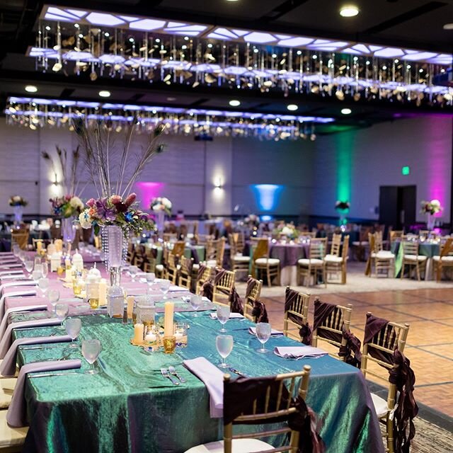 The colorful uplighting, beautiful linens and gorgeous floral centerpieces transformed this ballroom into a dream!⁠⠀
.⁠⠀
To see more, head to our blog through the link in our bio and check out our post.⁠⠀
.⁠⠀
.⁠⠀
Planner: @atouchofbliss⁠⠀
Photographe