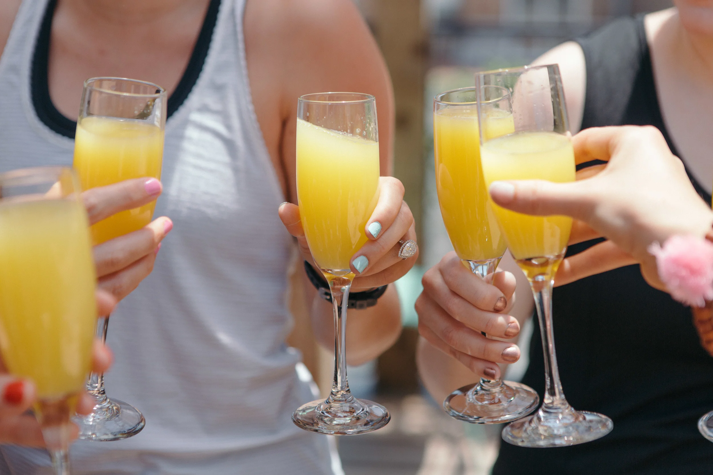 Nola Tribe Yoga - Bride Mimosa Cheers.jpg