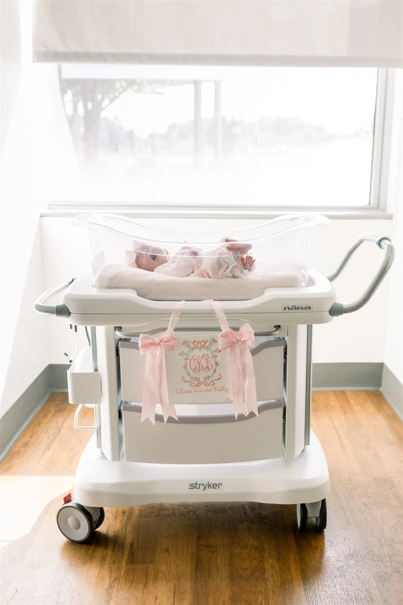 Baby in bassinet in front of window at John Muir Hospital in Walnut Creek, CA