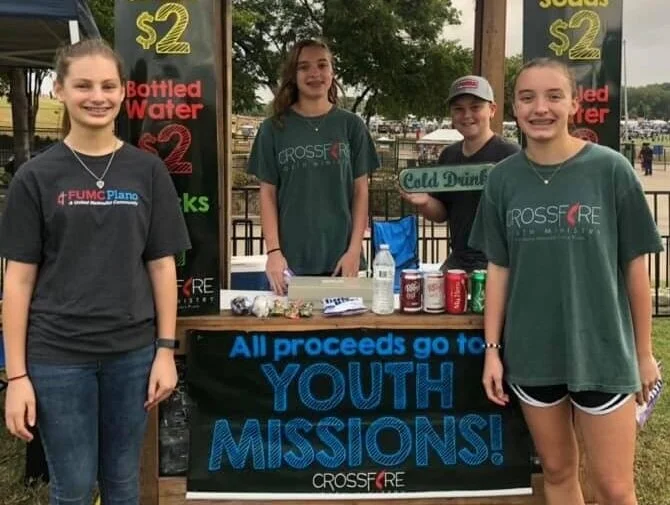 Our Crossfire Youth braved the winds selling concessions at the Plano Balloon Festival for missions! Photo by Sherri Zemanski