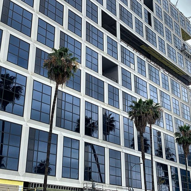 #5901sunset , the City of LA&rsquo;s first #BIPV job that fully encloses the building envelope.  PV cells are integrated into the insulated glass units that are installed within unitized curtain wall.  The PV curtainwall can be seen on the left side 