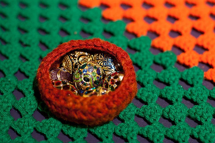 Nest #1, 2010-2011 / Altered costume jewelry in nests crocheted from deconstructed, found afghans