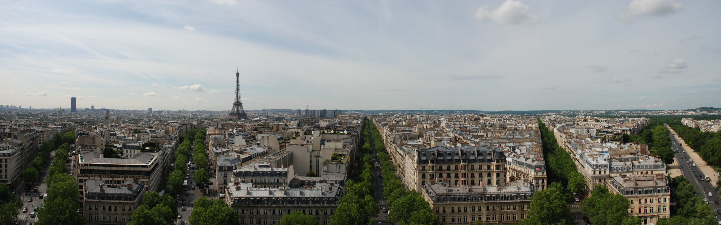 Panorama_of_Paris_from_top_of_Arc_de_Triomphe.jpg