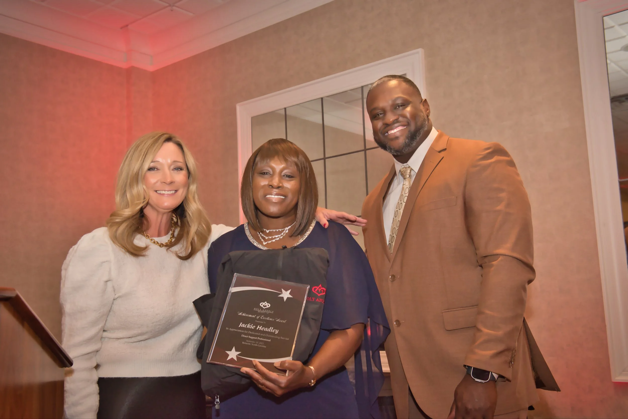 Jackie Headley receives her "Achievement of Excellence Award"